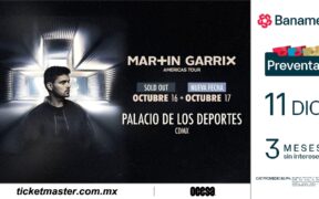 Martin Garrix durante un espectáculo con luces y láseres