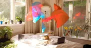 Persona sentada en una habitación, imagen ilustrativa de vivir solo en la ciudad